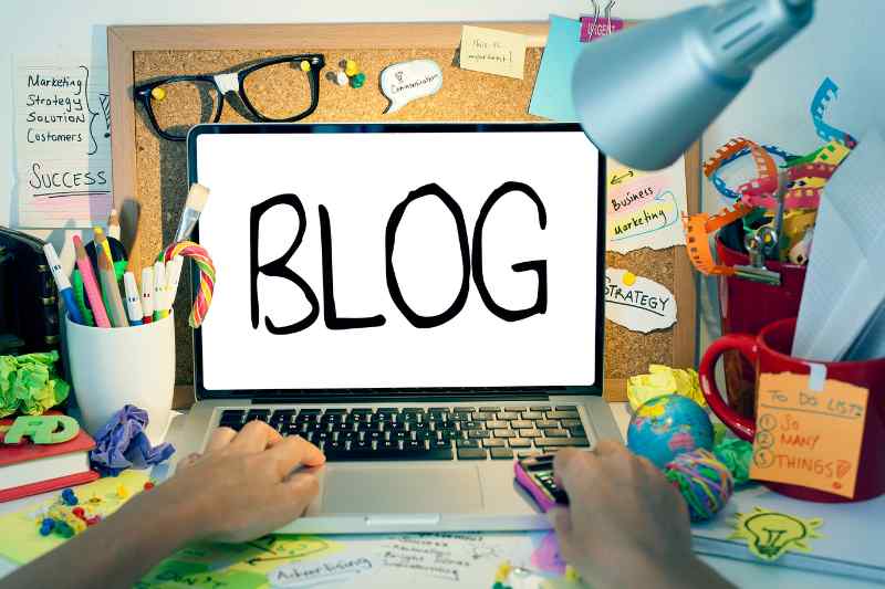 How to Start a Blog in Less Than 10 Minutes Laptop showing word blog on screen