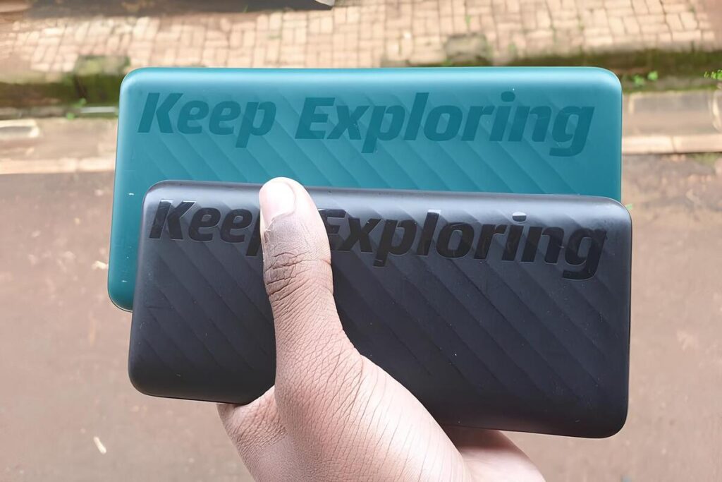 I’ve Tested Hundreds of Power Banks: Here’s What Actually Matters When You’re Buying One Person holding two power banks