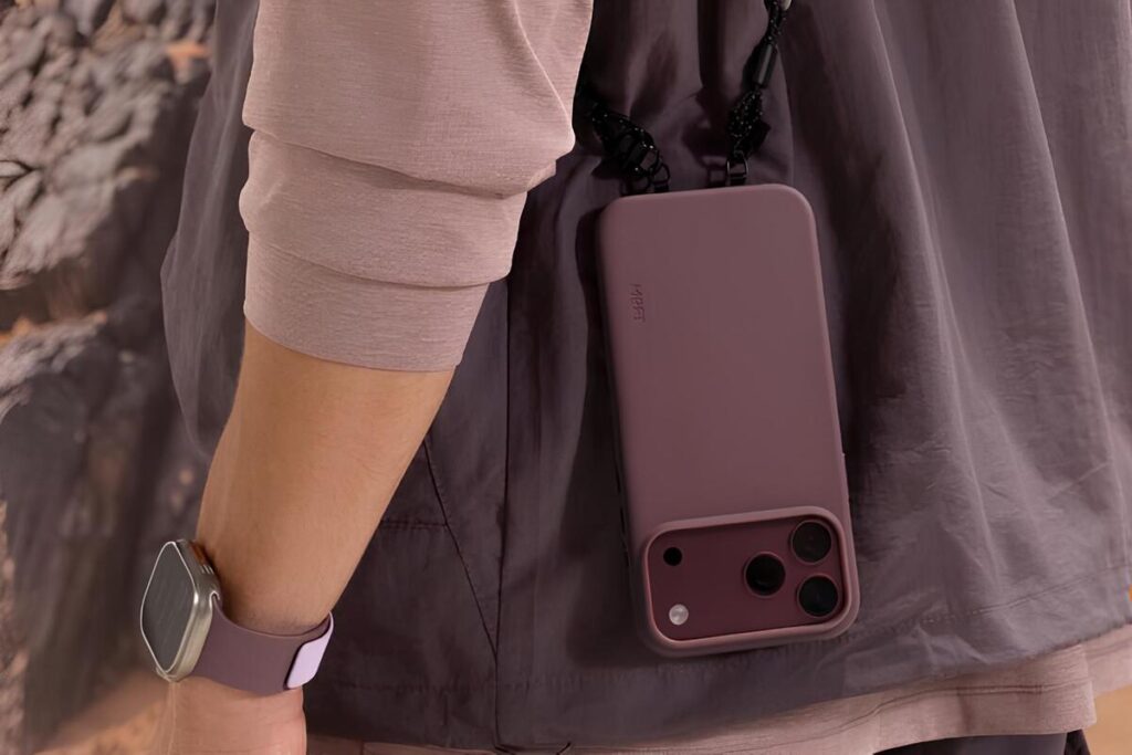 man carrying an iphone 18 pro hanging on shoulder
